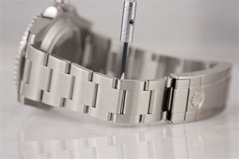 rolex links button